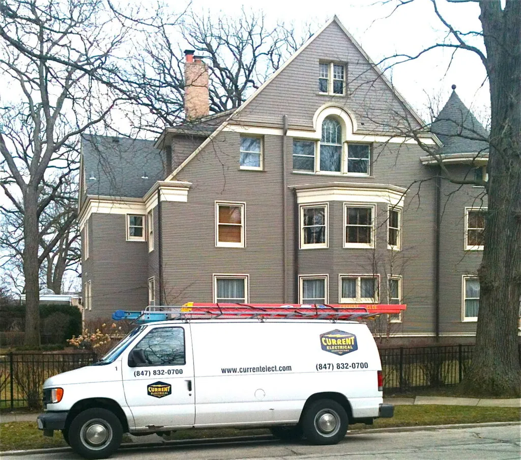 Current Electrical Contractors truck parked outside a Chicagoland home for a circuit breaker repair call